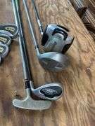 Callaway golf set, balls, and misc clubs drivers