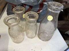 Vintage milk bottles, lot of springs, poly wire, 4’ LED shop light, Chevrolet sign