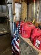 5 plastic gas cans, flags