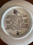 12 - 7.5” Russian designed wall plates (2 are chipped), decorative bird tray