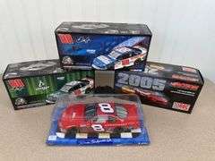 4 die-cast Nascar collector cars