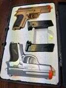 Pair of air soft guns