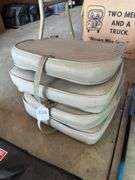 2 boat seats, fishing rods and tackle box