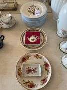 12 plates various flowers, “ceramiche Italy” (some chips), Dutch plate, Royal Albert ornament, England plate, Limoges trinket dish