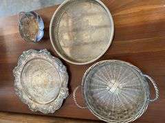 Silver plated dishes, basket weave with glass liner, charger, round reticulated and 3 footed basket