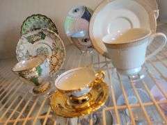 China Tea Cups and Saucers (including plastic stands)