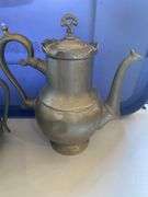 Hammered aluminum and pewter pieces, teapot, tobacco container, pitchers, vase