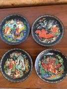 12 - 7.5” Russian designed wall plates (2 are chipped), decorative bird tray
