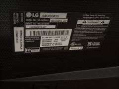 60" LG television with remote