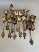 Silver plated candlesticks, sniffers, tobacco container, ashtray, utensils, miscellaneous