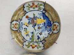 Pair antique hand painted decorative wall plates (one previously repaired)