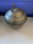 Hammered aluminum and pewter pieces, teapot, tobacco container, pitchers, vase