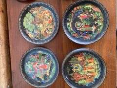 12 - 7.5” Russian designed wall plates (2 are chipped), decorative bird tray