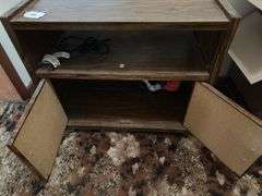Media cabinet on rollers