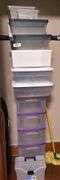 Large lot of storage boxes and shelves