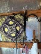 Shepard hooks, concrete angel, bag chair, artwork