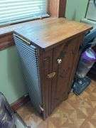Cabinet with fold ironing board