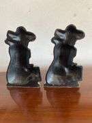 Golf brass figurines, cast iron bookends, plate