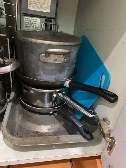 Pots, pans, stock pot, baking dishes, cooling racks and sieves