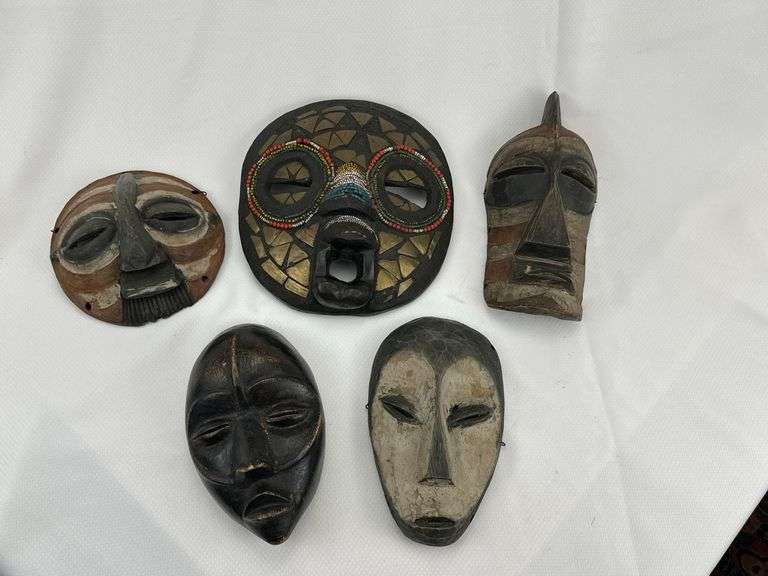 Group of Five Carved Tribal-Style Masks