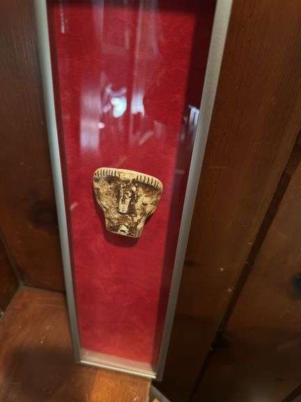 African Bone necklace in frame, tribal piece in frame