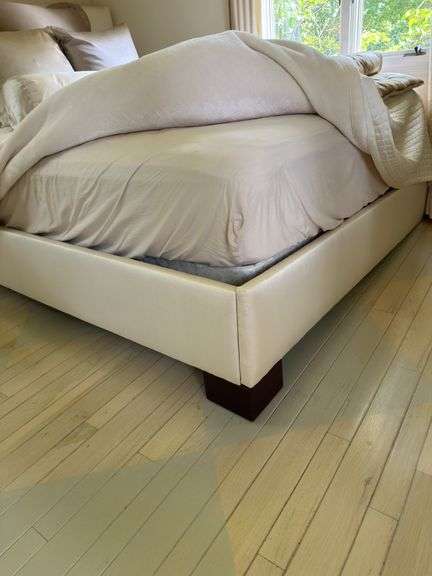 Full size upholstered ivory silk bed and bedding