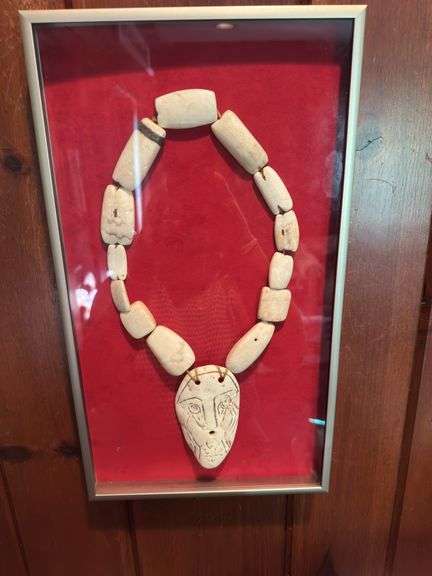African Bone necklace in frame, tribal piece in frame