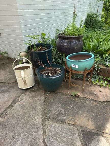 4 pots 1 stand  watering can image