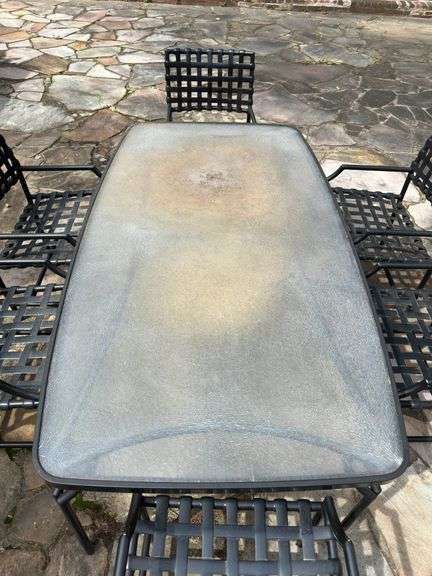 Brown Jordan patio table with lexan top and 6 chairs