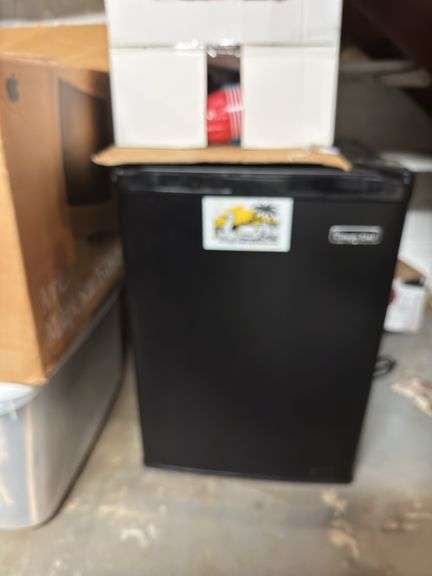 Magic chef refrigerator ( working condition unknown, but in good shape) in basement box of plastic ware image