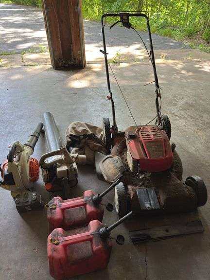 Troy-bilt  push mower, 2 gas powered blowers 2 plastic gas cans image