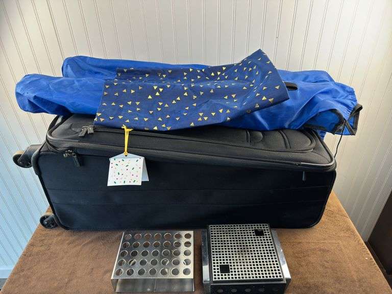 Large rolling suitcase, 2 bag chairs, 2 camping candle stoves/warmers