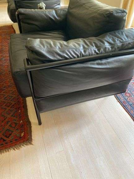 Pair of Montis black leather and tubular metal chairs in the manner of Le Corbusier LC3 armchair, excellent vintage condition