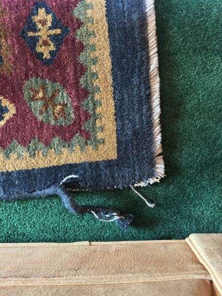 Hand knotted wool rug (missing some edging) 58” x 77”