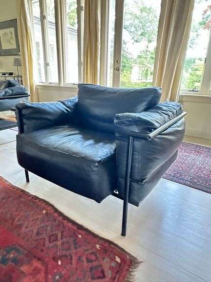 Pair of Montis black leather and tubular metal chairs in the manner of Le Corbusier LC3 armchair, excellent vintage condition