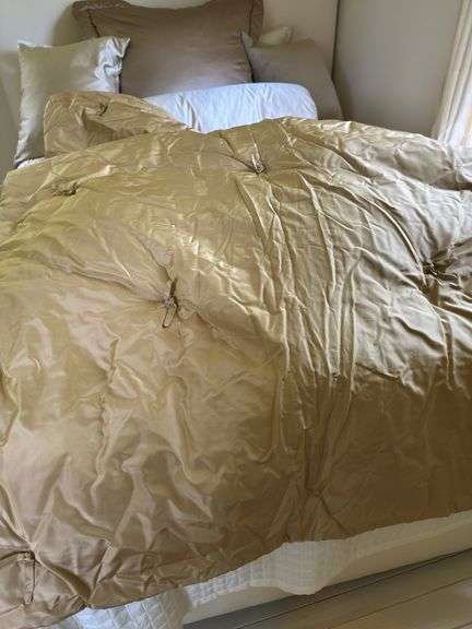 Left side of closet: rollerblades, backpack, brown velour pillows, king size pillow, small comforters 50” X 65”, image