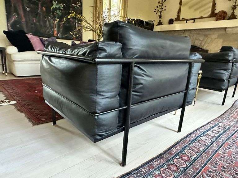 Pair of Montis black leather and tubular metal chairs in the manner of Le Corbusier LC3 armchair, excellent vintage condition