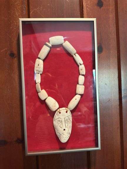 African Bone necklace in frame, tribal piece in frame