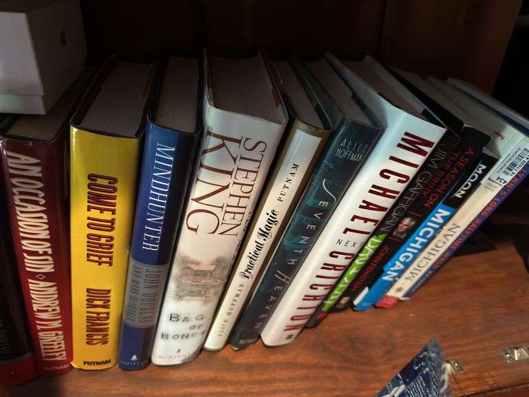 2 shelves of books mostly medical