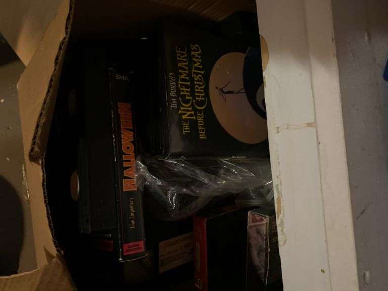 Contents of 5 doors, books, planters, metal box, VHS tapes, miscellaneous (in basement)