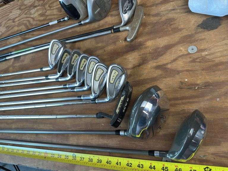 Callaway golf set, balls, and misc clubs drivers