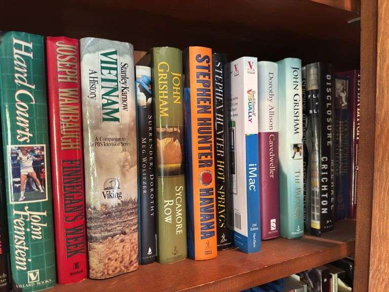 Shelf of hardback books