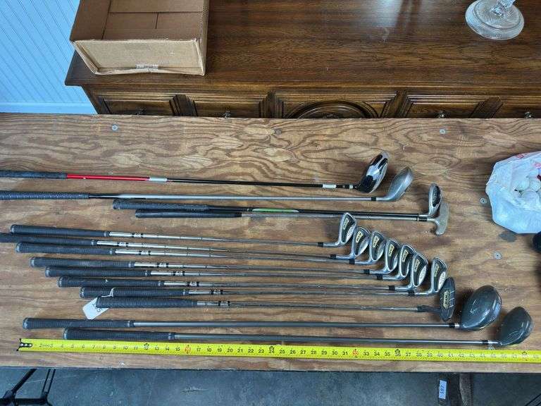 Callaway golf set, balls, and misc clubs drivers