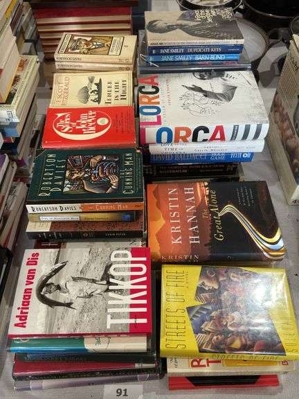 Paperback and hardcover books,  leisure reading
