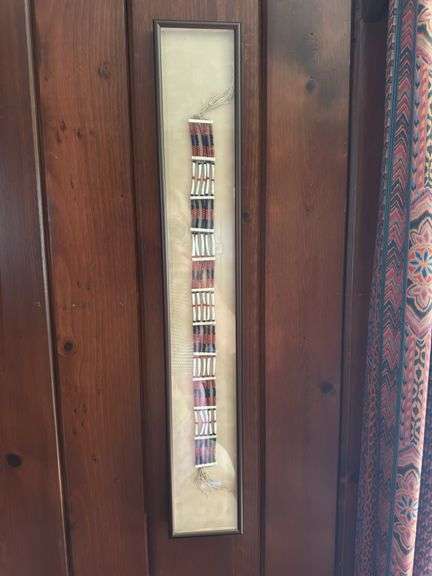 Beaded belt in frame