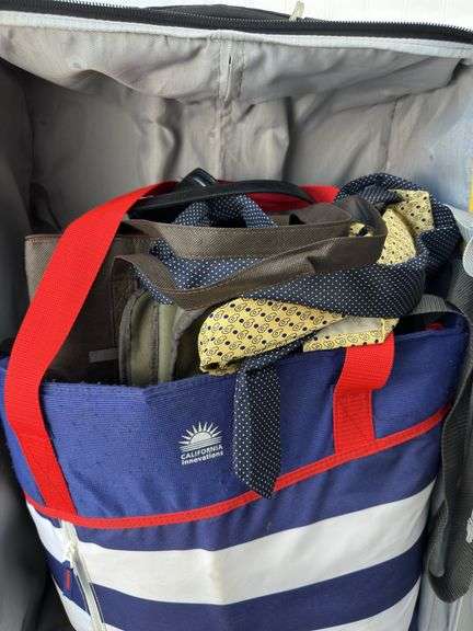 Large rolling suitcase, 2 bag chairs, 2 camping candle stoves/warmers