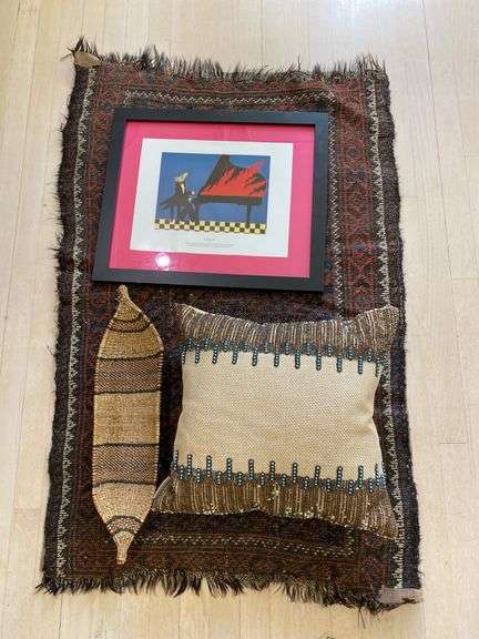 29” x 44” woven rug, matted and framed 20” x 17” picture “coyote 76” throw pillow, woven basket image