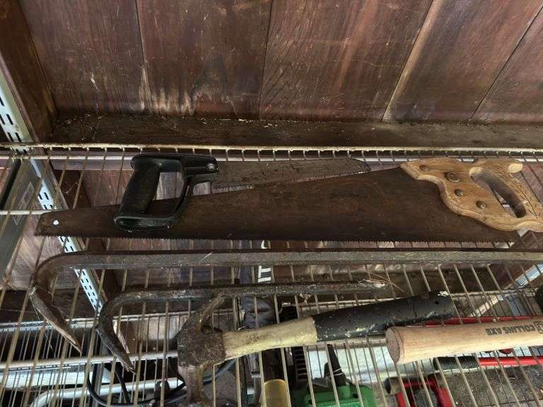 2 hammers, saws, and pry bars