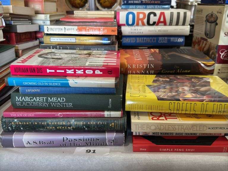 Paperback and hardcover books,  leisure reading