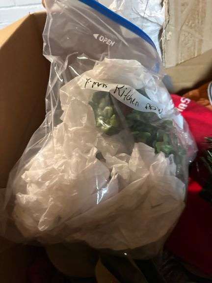 7 boxes of Christmas items. In basement